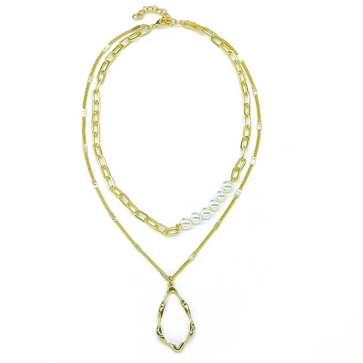 Guld pärlhalsbandset